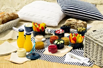 Wall murals Picnic Summer picnic on the beach. Serving picnic utensils blue with ve