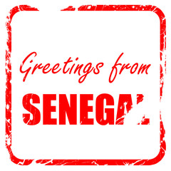 Greetings from senegal, red rubber stamp with grunge edges