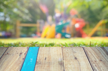 Motion blur playground in nature green park abstract background.