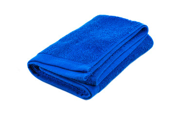 Blue soft bath towel isolated on white background