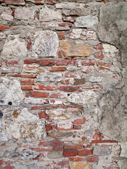 heavily worn tuscan brick wall