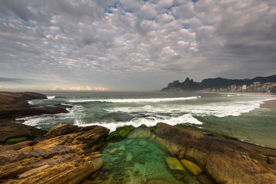 Arpoador Beach Rocks and Dramatic Sky Above Rio de Janeiro