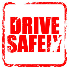 drive safely, red rubber stamp with grunge edges
