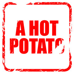 a hot potato, red rubber stamp with grunge edges