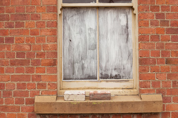 Fototapeta premium Window blocked out with white paint