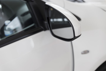 rear mirror of white car