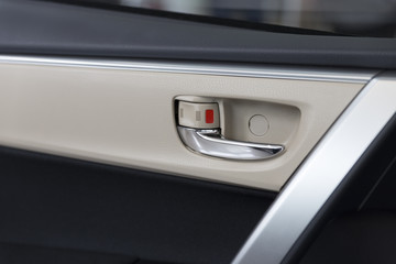 Obraz na płótnie Canvas door handle inside of new car