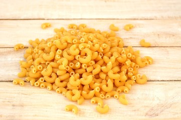 Pasta on the wooden background