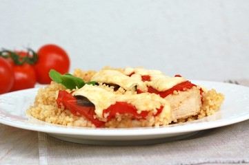 Chicken fillet withe potatoes, cheese, basil and couscous