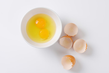 cracked eggs in a bowl