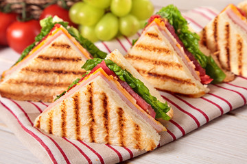 Summer picnic club sandwich ham and cheese close up