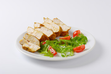 Spicy chicken breast with garnish