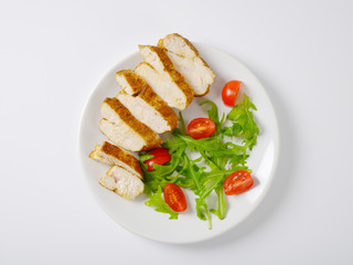 Spicy chicken breast with garnish