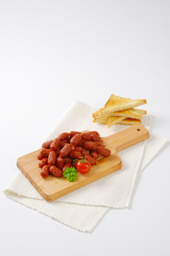 mini dry sausages and toast