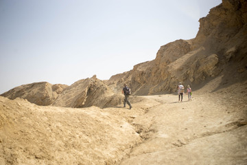 Fototapeta na wymiar Family hiking in desert