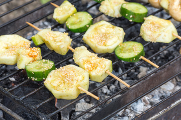 Zucchini and cucumber on the kebab grilling