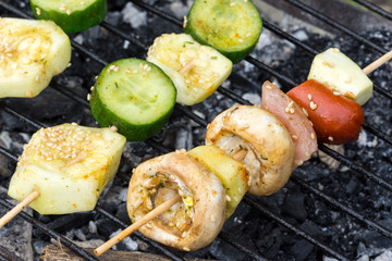Meat and vegetables on the hot grill
