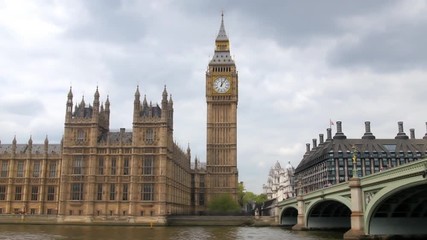 Dolly view of the House of Parliament and the Big Ben by Westminster bridge in London - Powered by Adobe