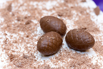 Three chocolate easter egg on the cake
