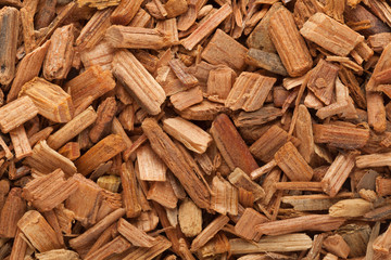 Organic Himalayan cedar or Devadar (Cedrus deodara) Chips. Macro close up background texture. Top view.