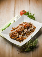 roasted meat with tomatoes, selective focus