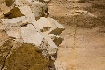 Rocky coast formed by sandy sediments.