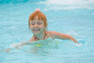 Fototapeta na wymiar Girl in the pool
