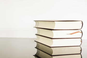 stack of  books on white.