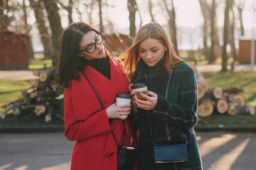 Two girls with gadget