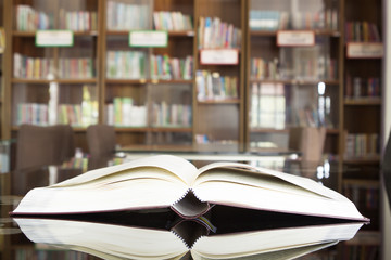 Open books with library.