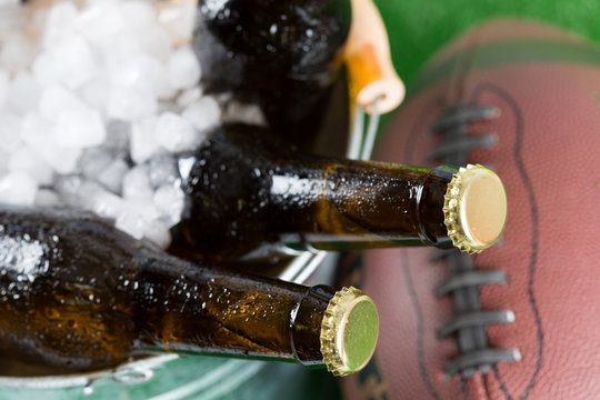 American football with a cold beer in a bucket