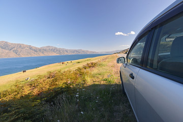 Obraz na płótnie Canvas Travel New Zealand by car, Lake Hawea in the background.