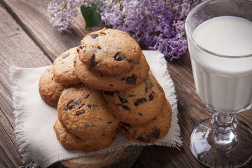 Stack of cookies with glass of milk