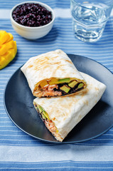 Salmon avocado mango black rice burritos