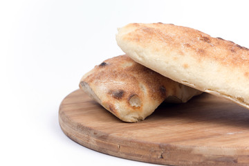 Balkan somun bread on the wooden board