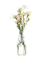bunch of flowers and glass vase.