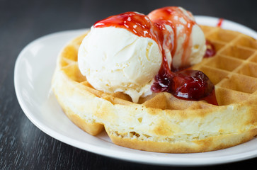strawberry waffle with vanilla ice cream,selective focus