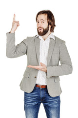 man looking at camera and pointing finger up. image isolated ove