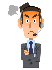 ヘッドセットを装着したビジネスマンが青ざめる
