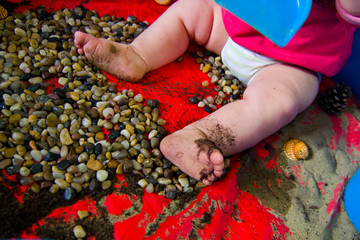 child playing on the beach