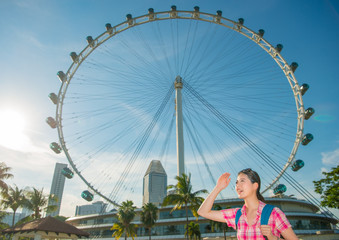 Fototapeta premium Happy Asia woman Travel in Singapore, Singapore Flyer