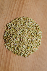 Raw buckwheat on the board