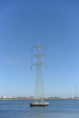Power lines in the water at the harbor on tunis