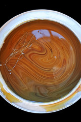 Oil paint in a metal pot