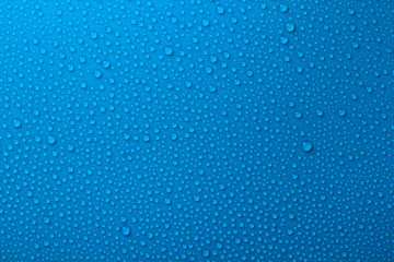 blue surface with water drops