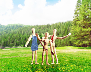 Obraz premium Family of wooden figures