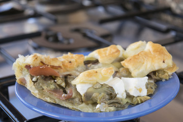 leftovers of savoury tart filled with ham mozzarella and articho