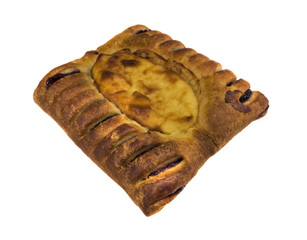 Roll out puff pastry on a white background.