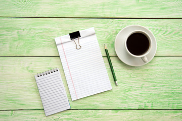 notebook with cup of coffee