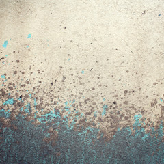 Frame for text. Urban wall close-up. Paint and mud on concrete surface. Aged photo. Retro photo. Vintage effect. Street wall close up. Macro photo background. Toned filter.